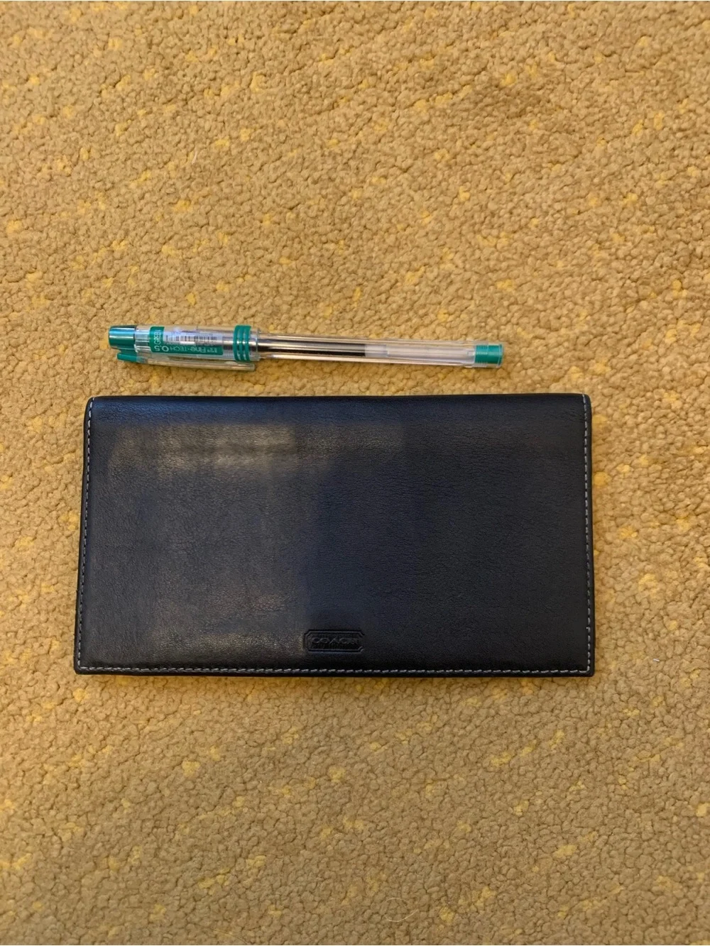Coach black leather checkbook cover